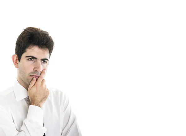 Joven hombre de negocios dudoso — Foto de Stock