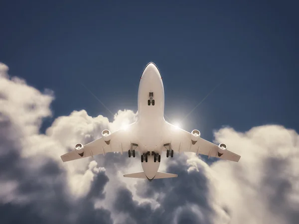 Airplane taking off with clouds on background — Stock Photo, Image