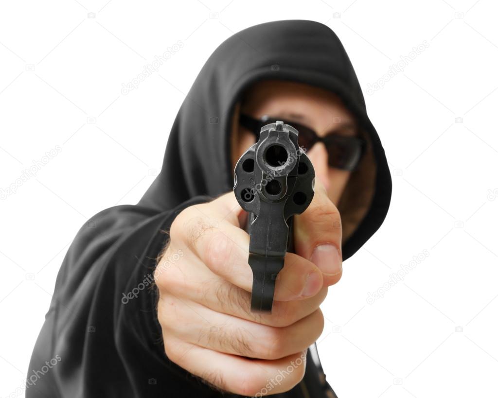 Man shoots a gun, gangster, focus on the gun, isolated on white