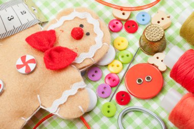 Sewing set and handmade gingerbread man from textile clipart