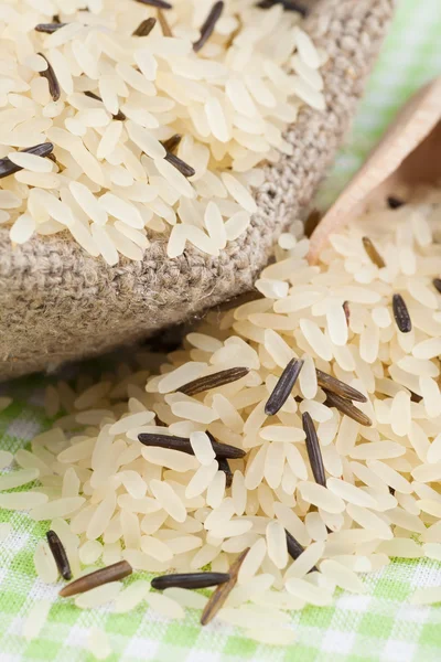 Rice in burlap sack — Stock Photo, Image