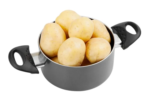 Fresh potatoes in cooking pot, isolated — Stock Photo, Image