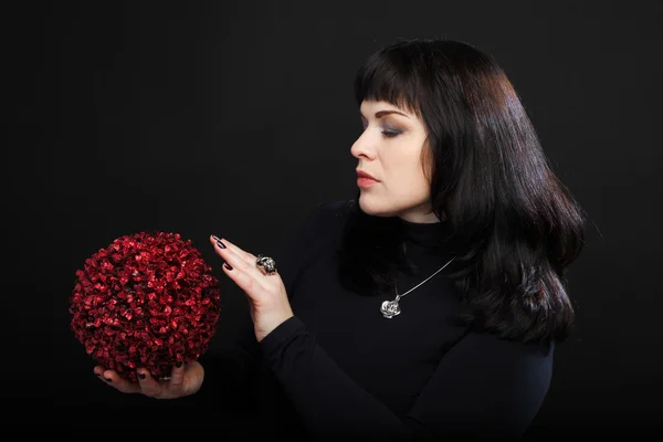 Wizard woman or fortune teller holds red magic ball — Stock Photo, Image