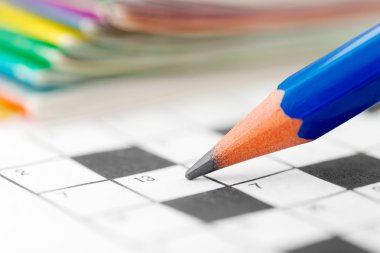 Crossword Puzzle and Pencil clipart