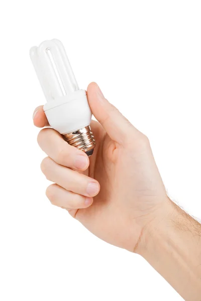 Hand holding energy saving fluorescent light bulb — Stock Photo, Image