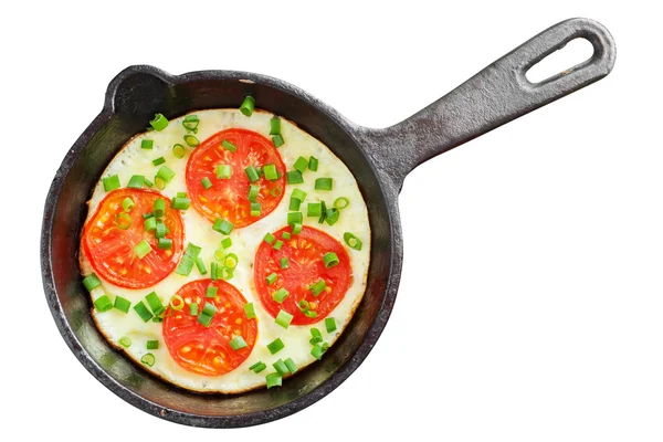 Frigideira com ovos mexidos e tomates — Fotografia de Stock