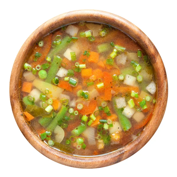 Zeleninová polévka v dřevěné příď — Stock fotografie