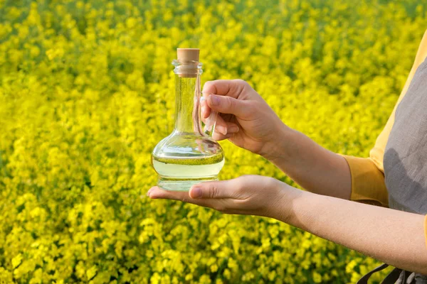 Woman Stands Rape Field Holds Glass Bottle Jug Rapeseed Oil — Stock Photo, Image