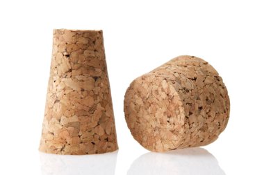 Natural wine corks closeup. Two natural wine corks on white.