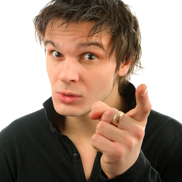 Portrait of young man showing finger — Stock Photo, Image