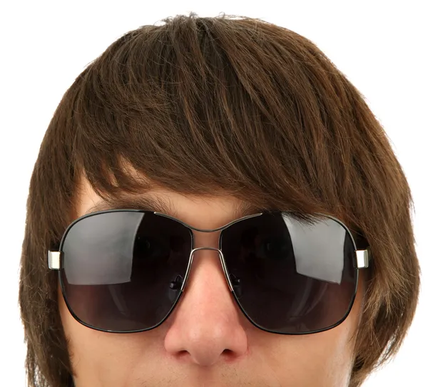 A fiatal férfi napszemüveg vezetője — Stock Fotó