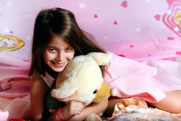 Young girl with teddy bear — Stock Photo, Image