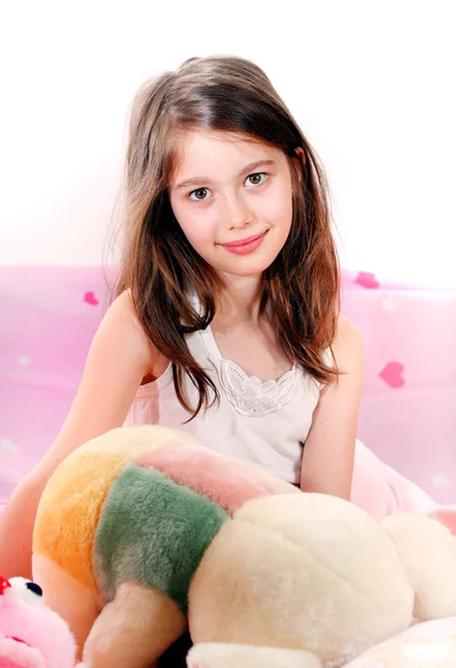 Young girl with teddy bear — Stock Photo, Image