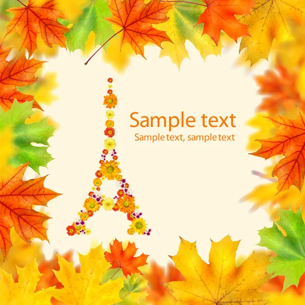 Eiffel tower of flowers with autumn leaves frame — Stock Photo, Image