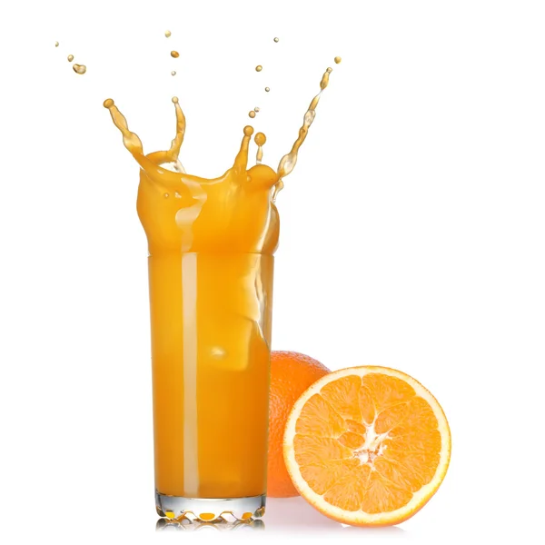 Splash of juice in the glass with orange isolated on white — Stock Photo, Image