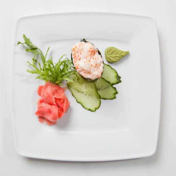 Sushi on plate isolated on white — Stock Photo, Image