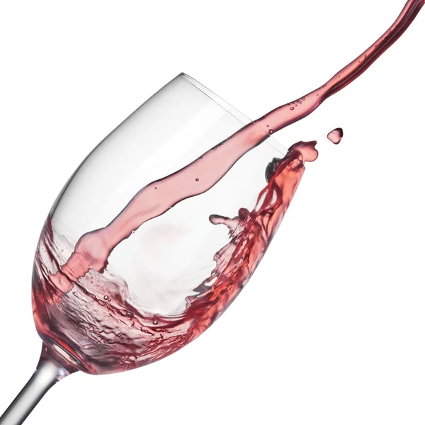 白ワイングラスにロゼワインのスプラッシュ — ストック写真