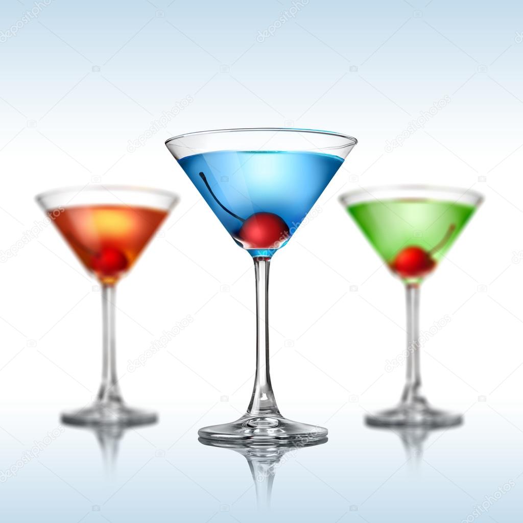Different martini color cocktails on white