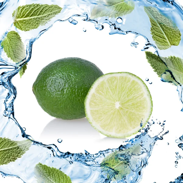 Water splash with lime and green mint isolated on white — Stock Photo, Image