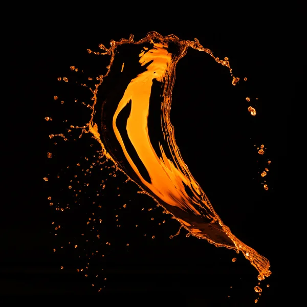 Orange Wasserspritzer isoliert auf schwarz — Stockfoto