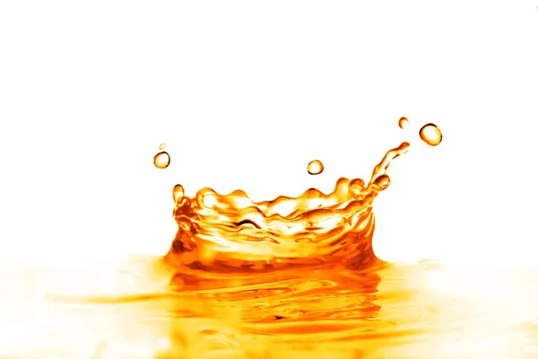 Orangefarbener Wasserspritzer isoliert auf Weiß — Stockfoto