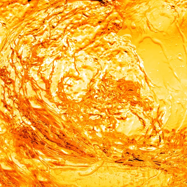 Acqua arancione con fondo spruzzata — Foto Stock