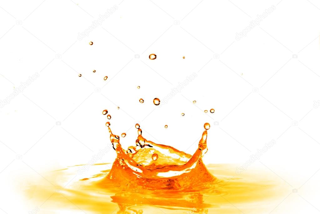 drop falling into orange water with splash isolated on white