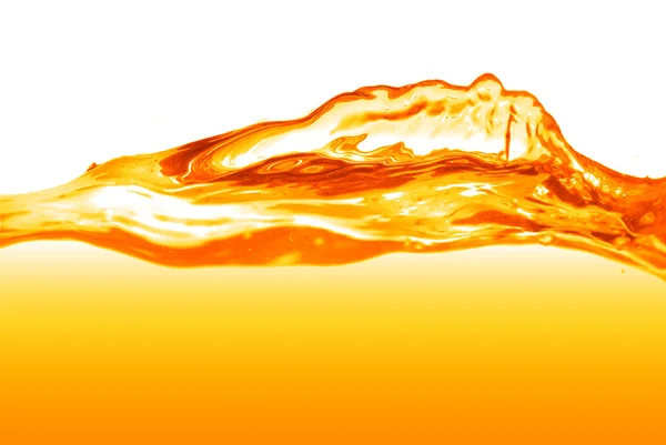 Spruzzata d'acqua arancione isolata su bianco — Foto Stock