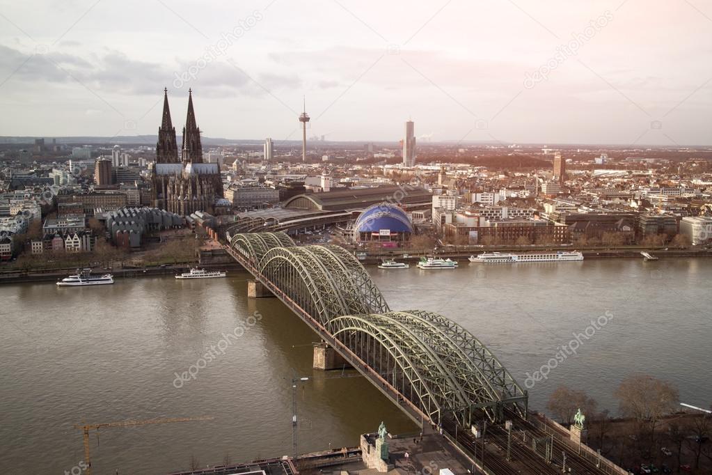 View of Koeln, Germany. Gothic cathedral and steel bridge over r