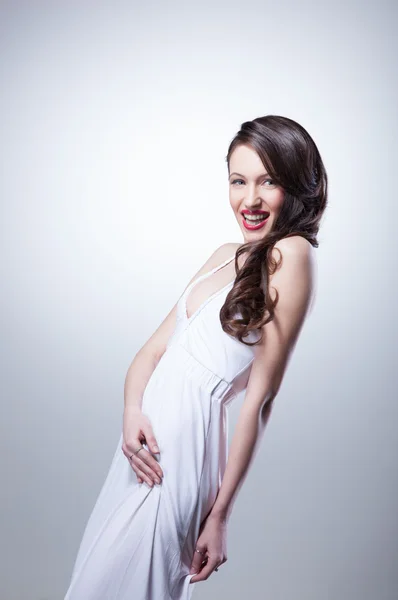 Portrait of sexy woman in white dress — Stock Photo, Image