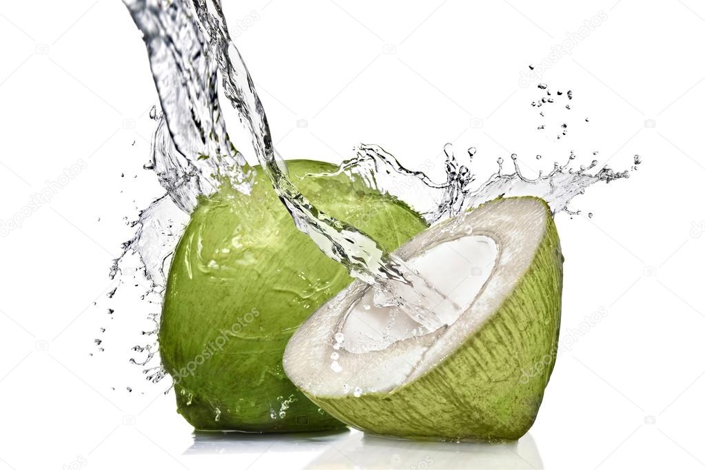 Splash of water on green coconut isolated on white — Stock Photo