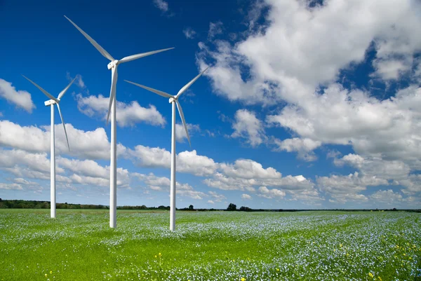 Wind generator turbine on spring landscape — Stock Photo, Image