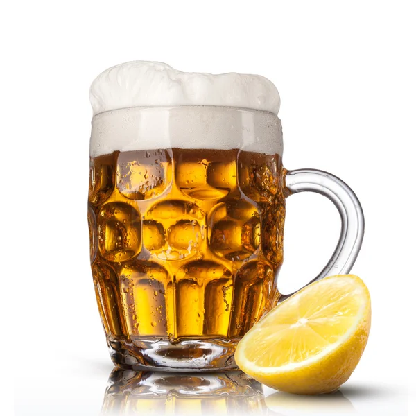 Beer in glass with lemon isolated on white background — Stock Photo, Image