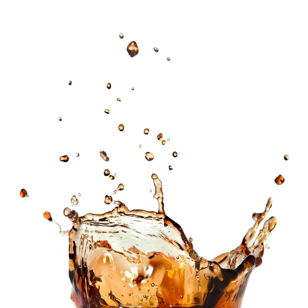 Splash of cola in glass isolated on white — Stock Photo, Image