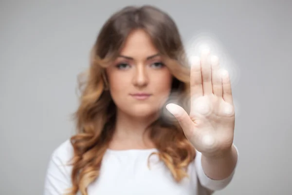 Woman pressing touchscreen button — Stock Photo, Image