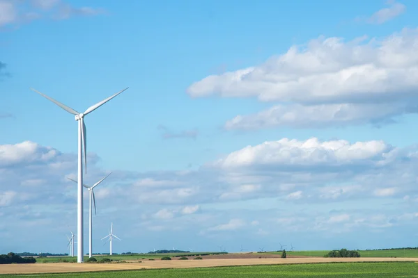 Wind generator turbine on summer landscape — Stock Photo, Image