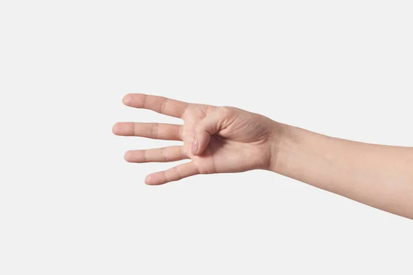 指の数カウント 手首と女性の手は 水平方向の位置で4と 4番目 白の背景に分離 指の数を数える — ストック写真