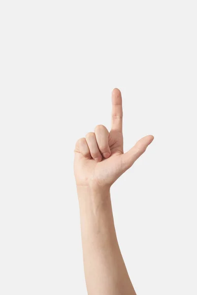 指を上に向けて内側の手のひら 手話の指のアルファベットL字 白い背景に孤立した垂直位置の女性の手 — ストック写真