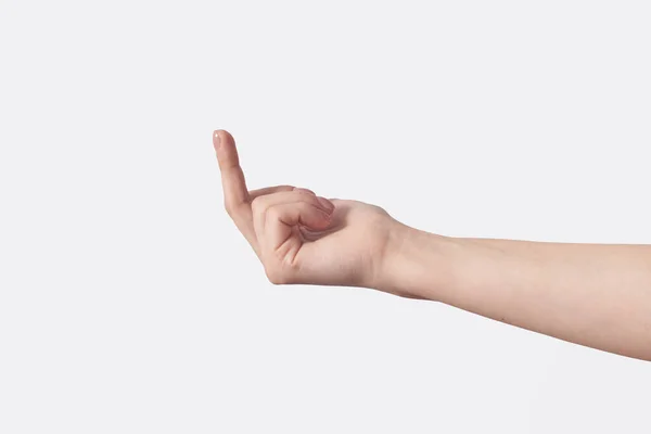 挑発的な中指横攻撃ジェスチャーで白い背景に隔離された女性の手 攻撃性又は不敬意のジェスチャー — ストック写真
