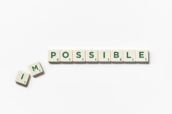 Lehetetlen Fordult Lehetséges Szó Készült Scrabble Blokkok Fehér Alapon — Stock Fotó