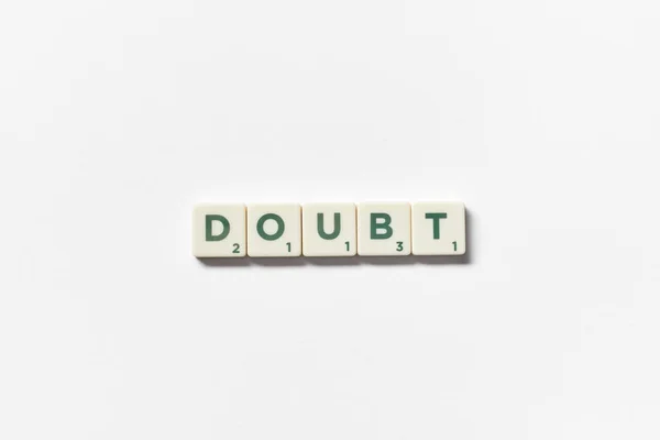 Doubt Word Formed Scrabble Tiles White Background Still Life Copy — Photo