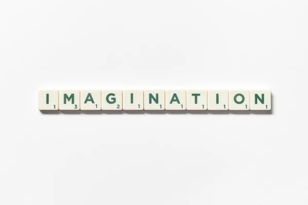 Word Imagination Formed Scrabble Blocks White Background Creative Template Copy – stockfoto
