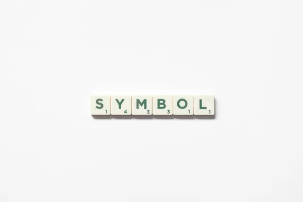 Symbool Woord Gevormd Van Scrabble Blokken Witte Achtergrond Stilleven Met — Stockfoto