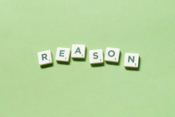 Reason Word Formed Scrabble Tiles Green Background Creative Business Postcard — Photo