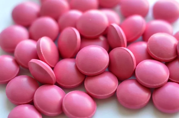 Dispersión de tabletas rosadas —  Fotos de Stock