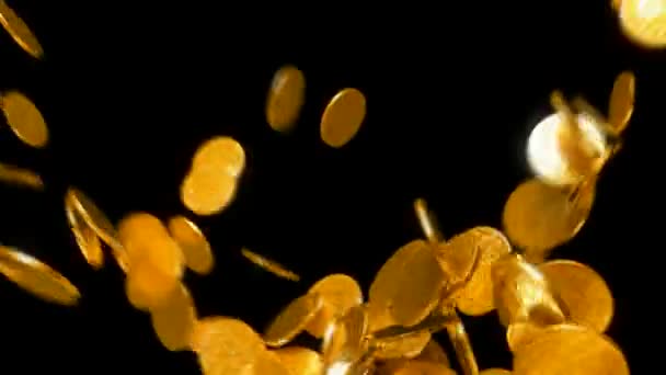 Y-förmige Münzen fließen in Zeitlupe — Stockvideo