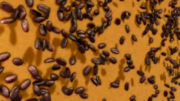 Coffee beans falling down over sacking background with slow motion — Stock Video