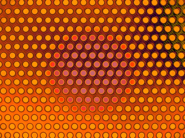 Golden metallic pattern with holes — Stock Photo, Image