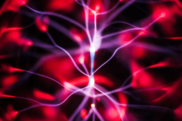 Plasma ball: beams and traces in the dark — Stock Photo, Image