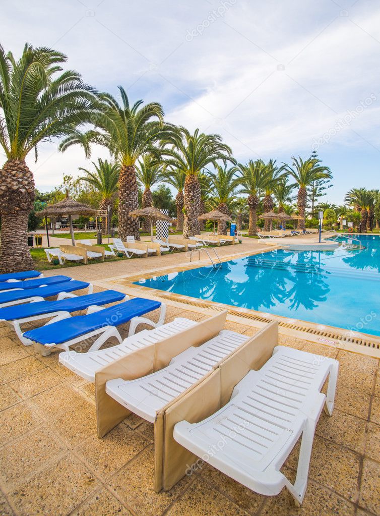 Swimming pool and deck chairs